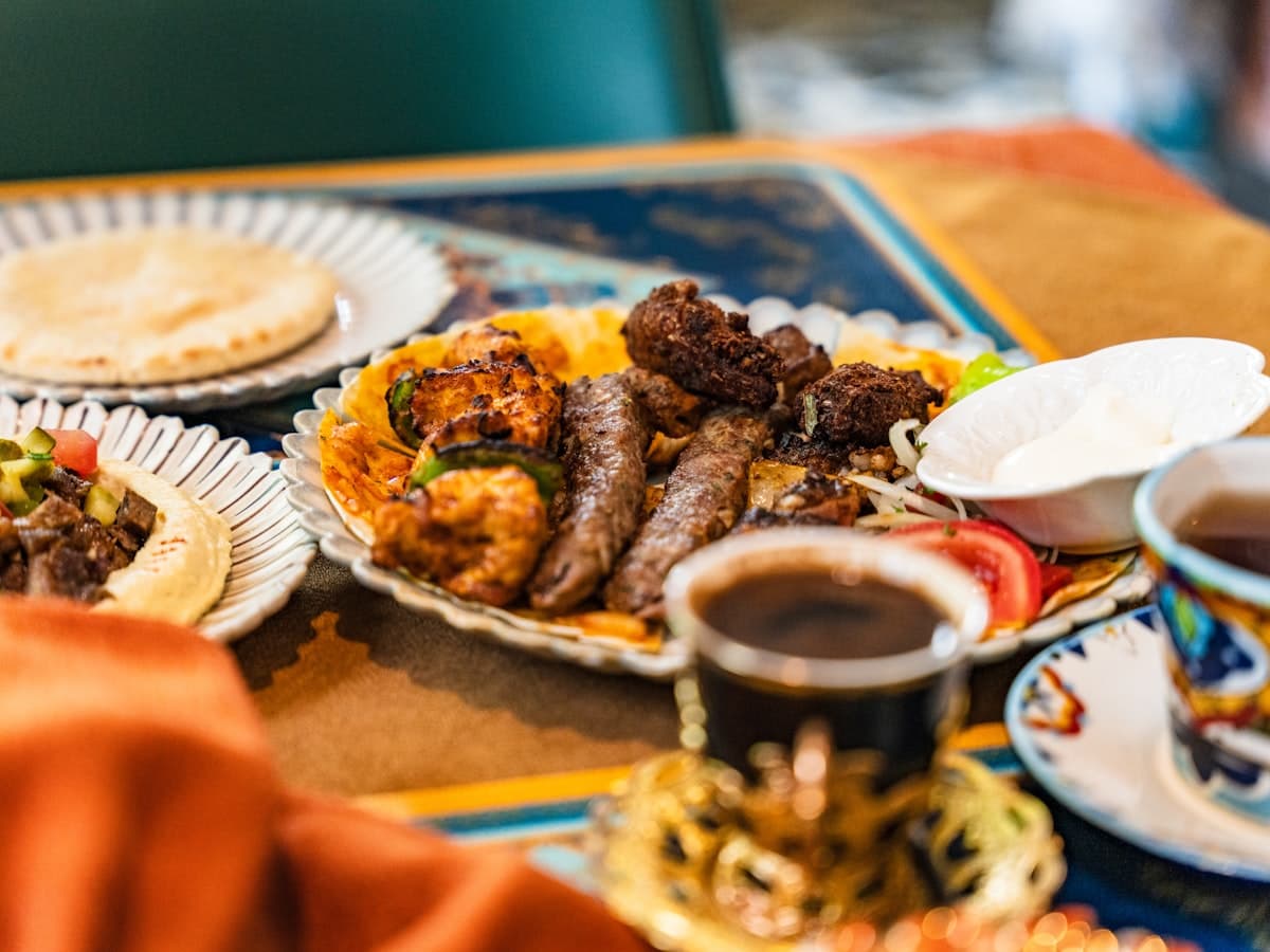 A platter of mixed grilled kebabs with flatbread