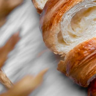 A tray of freshly baked croissants